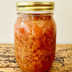 mason jar with fermented carrots inside